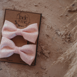 Amelia Bow Hair Clip In Sparkling Pink